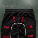 Conjunto Trapstar Irongate 2.0 Shellsuit Preto e Vermelho